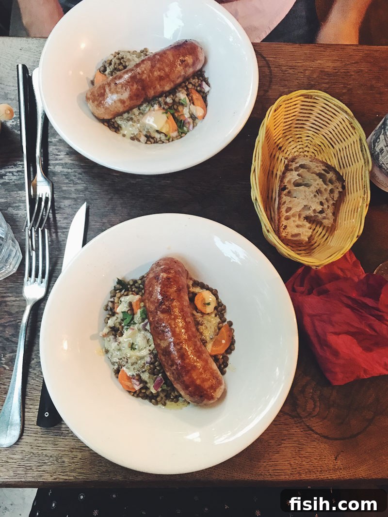 Delicious Paris cafe lunch featuring sausage and bread