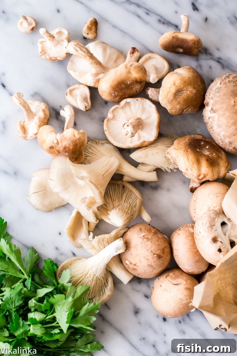 A beautiful composition of freshly foraged wild mushrooms, nestled amongst sprigs of vibrant parsley on a cool marble surface, highlighting the natural beauty of the ingredients.