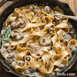 top down of a pan of mushroom stroganoff with thick pasta
