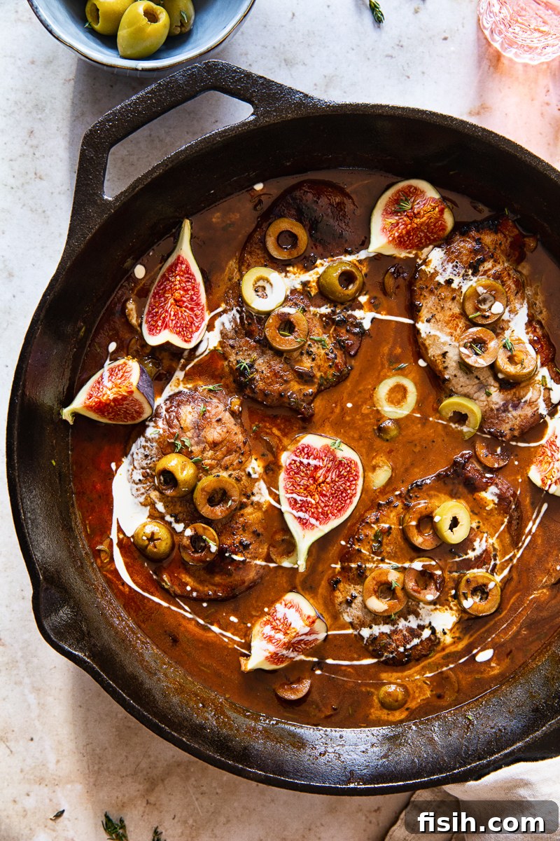 sweet and sour pork loin steaks in sauce with figs