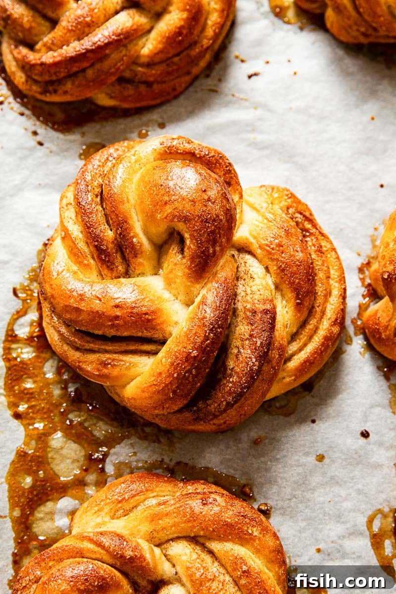Fluffy Cinnamon Buns From Scratch 7 Cinnamon rolls on baking sheet