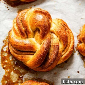Fluffy Cinnamon Buns From Scratch 8 Cinnamon rolls on baking sheet