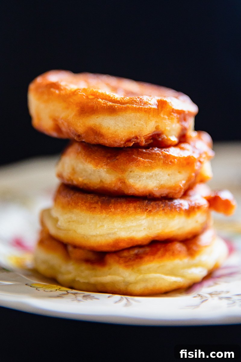a stack of 4 fritters on plate