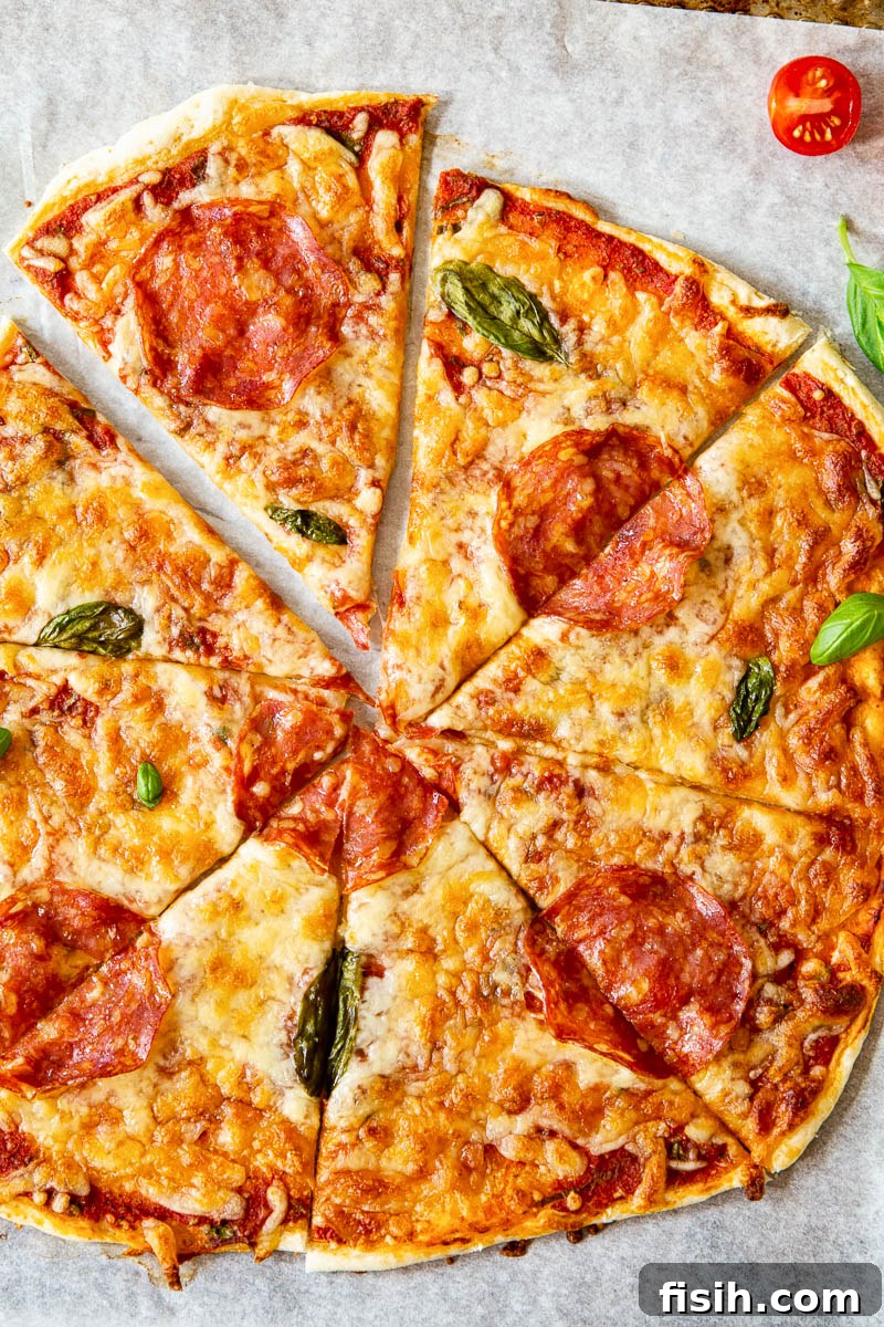 Crispy Puff Margherita 4 Top down view of puff pastry pizza with pepperoni, ready to be served