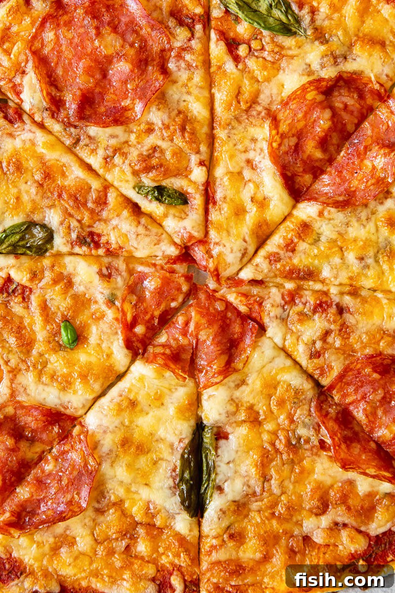 Crispy Puff Margherita 6 Close up of a delicious Puff Pastry Pepperoni Pizza with a perfectly golden crust and melted cheese