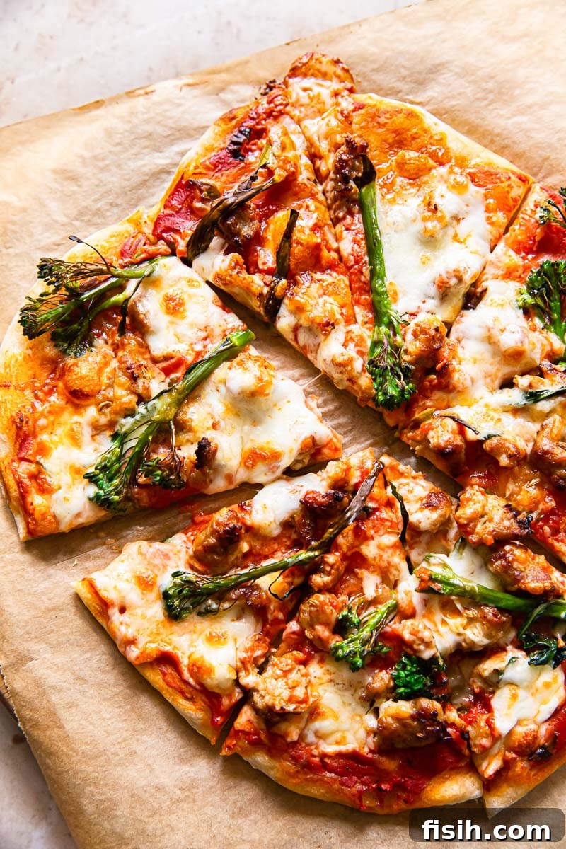 Baked spicy sausage and broccoli pizza, fresh from the oven