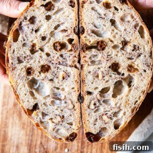 walnut and raisin bread cut in halh
