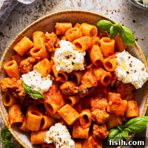Zesty Sausage Pasta with Creamy Ricotta 7 A bowl of spicy sausage and ricotta pasta, ready to be served.