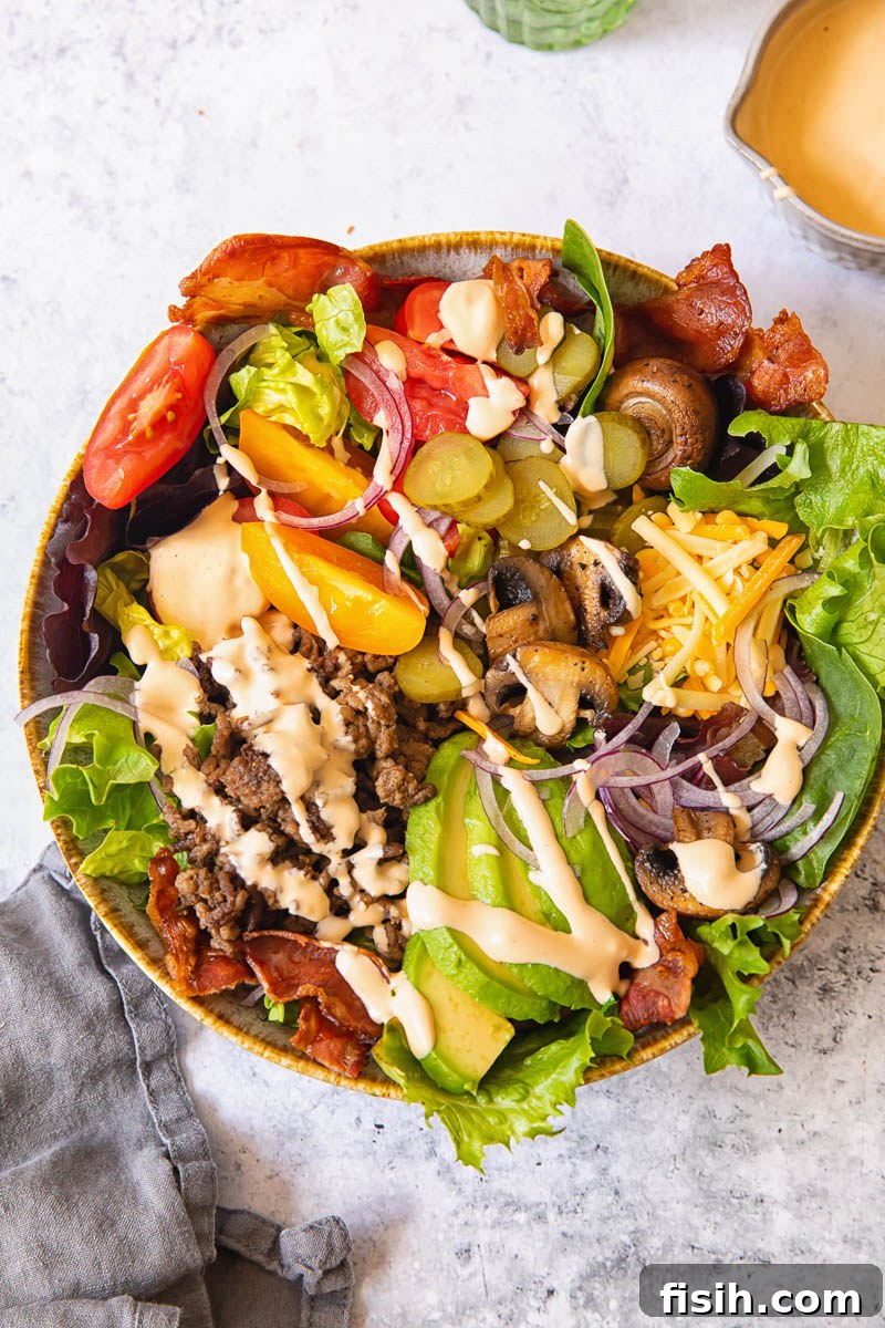 top down view of a salad with hamburger