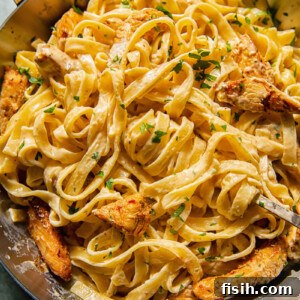 creamy pasta with chicken in a pan