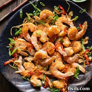 Crispy Air Fryer Salt and Pepper Shrimp 7 air fryer fried shrimp on a platter
