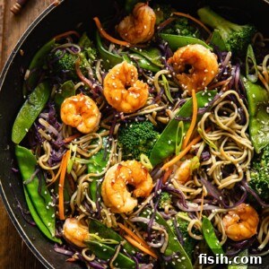 Sizzling Prawn Noodle Stir-Fry 6 top down view of prawn noodle stir fry in a wok