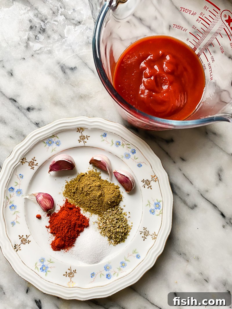 Lightning Fast Instant Pot Shredded Chicken Tacos 4 Ingredients for Instant Pot shredded chicken tacos including chicken breasts, spices, and crushed tomatoes