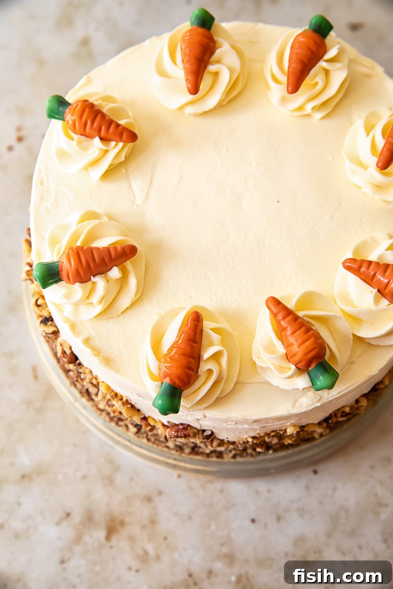 Moist Carrot Cake with Tangy Cream Cheese Frosting 4 Close-up of the carrot cake, highlighting the texture of the cake and the smooth frosting.