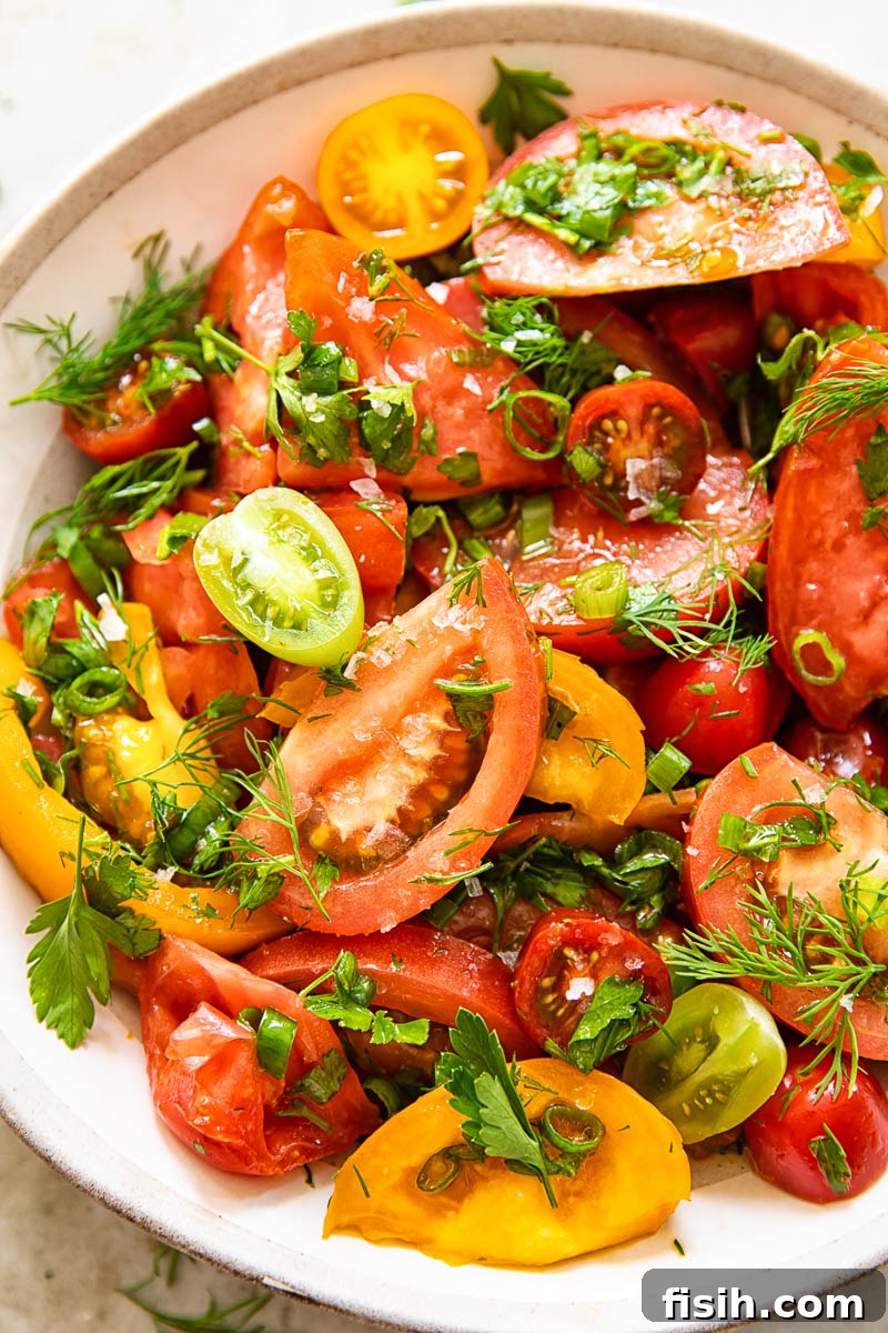 close up of tomato salad with herbs