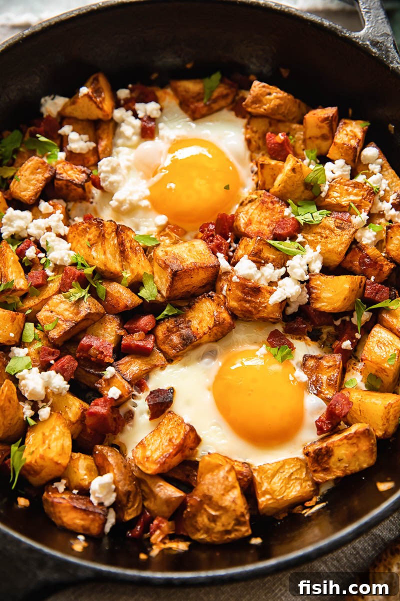 Savory Chorizo Hash with Tangy Feta 2 breakfast skillet with fried potatoes, eggs, chorizo and feeta