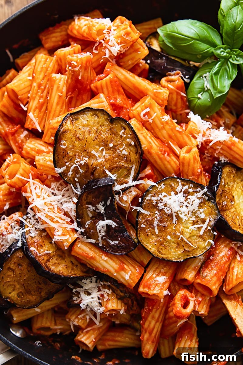 Sicilian Eggplant Pasta Alla Norma 4 close up of pasta in tomato basil sauce with fried aubergine on top