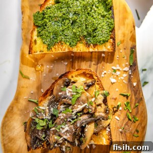 Forest Mushroom Toasts 5 crostini on a wooden board