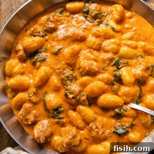 Pillowy Gnocchi & Sausage with Bold Romesco 6 top down view of gnocchi with romesco sauce in a pan
