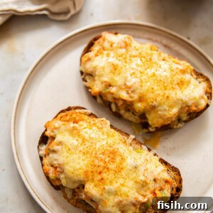 Hot cheesy salmon sandwiches on a plate, ready to be served