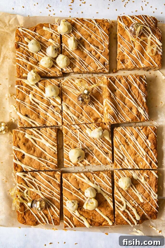 Top down view of freshly baked brown butter hazelnut blondies, cut into perfect squares and ready to serve