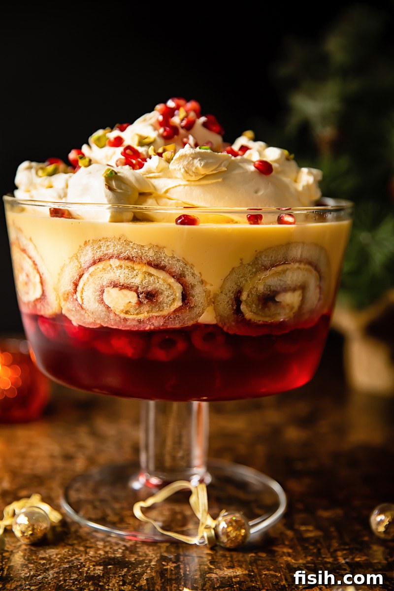 View of traditional trifle in a trifle bowl with a festive background, perfect for Christmas
