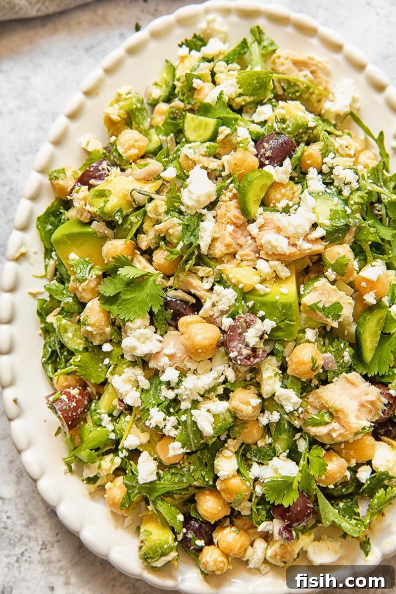 top down view of a salad on white serving platter
