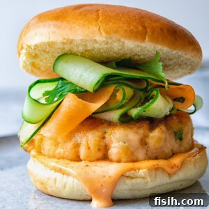 Salmon burger on a grey plate