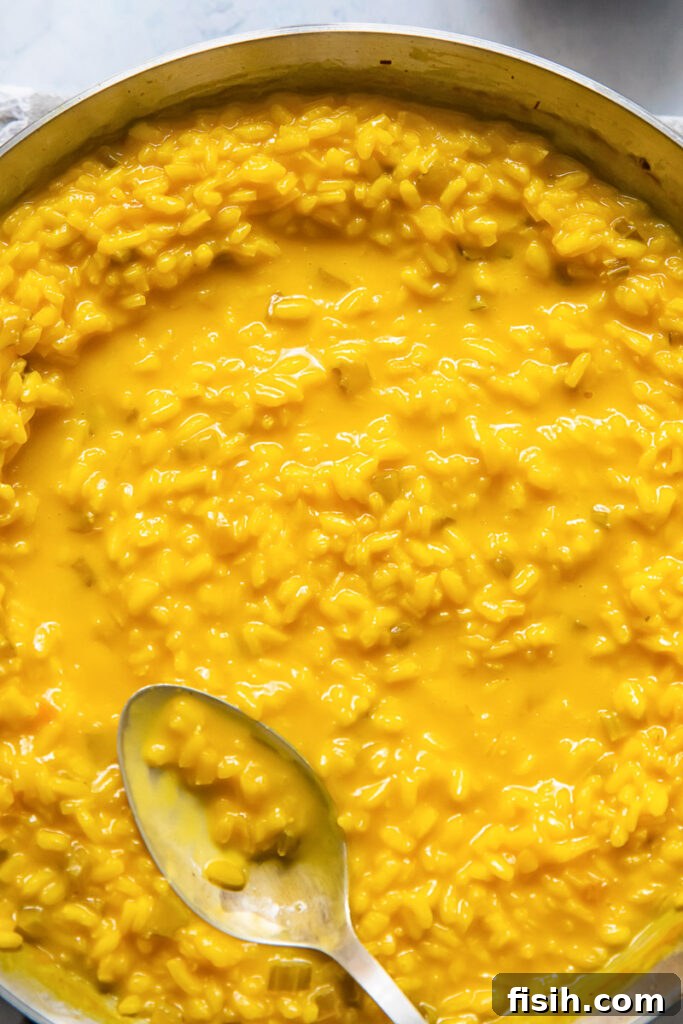 Liquid Gold Saffron Risotto 3 Close up of a pay of saffron risotto