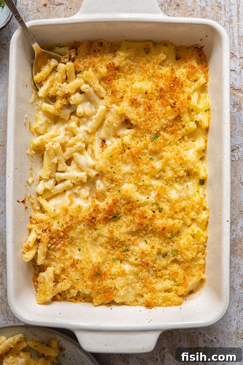 Gourmet Truffle Mac and Cheese 3 Top down view of truffle mac and cheese in a baking dish, with a golden brown crust.