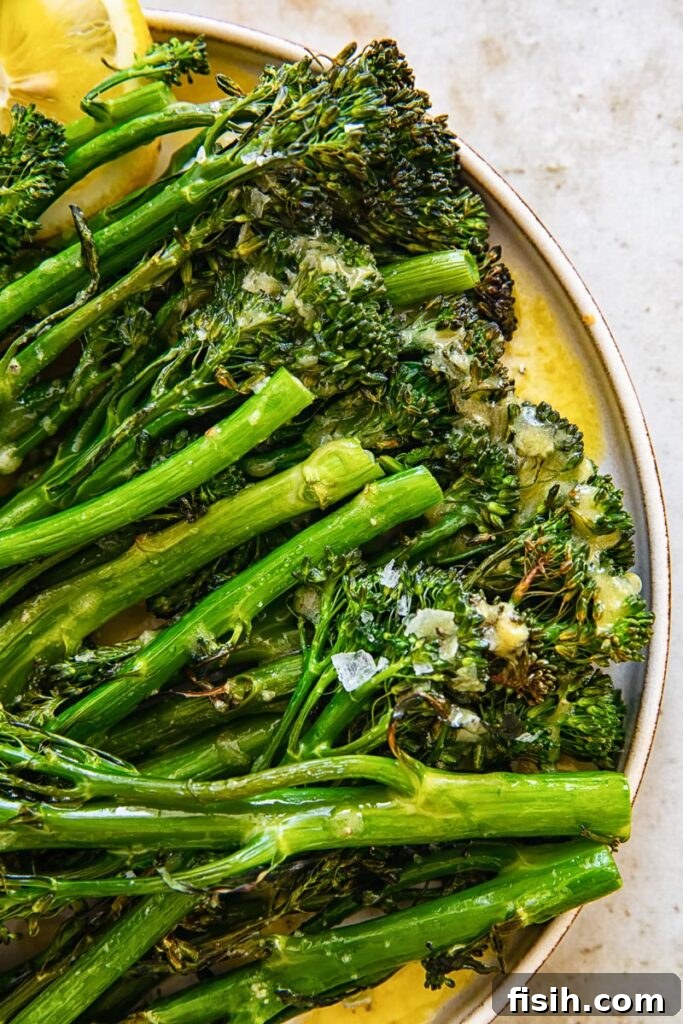 Golden Roasted Tenderstem Broccoli with Zesty Lemon Garlic Vinaigrette 3 Close up of the broccoli with salt and lemon