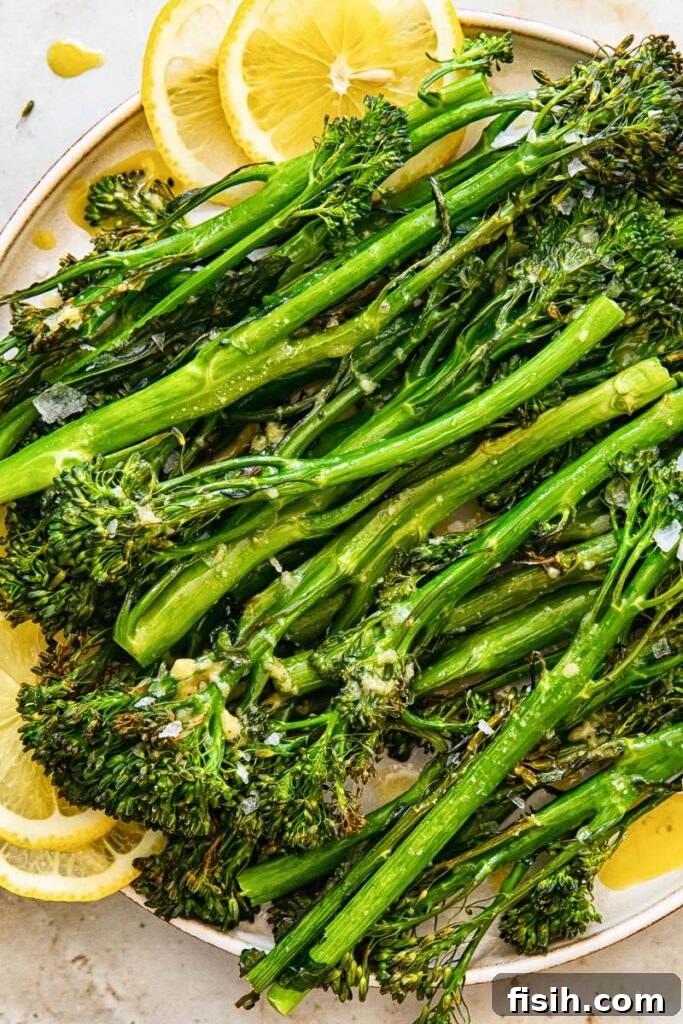 Golden Roasted Tenderstem Broccoli with Zesty Lemon Garlic Vinaigrette 5 Close up of the stems on a plate