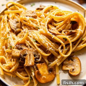Side shot of vegetarian mushroom carbonara on a plate