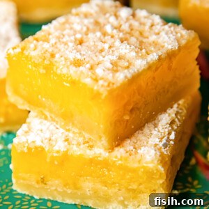 Close up shot of stacked lemon bars on a platter