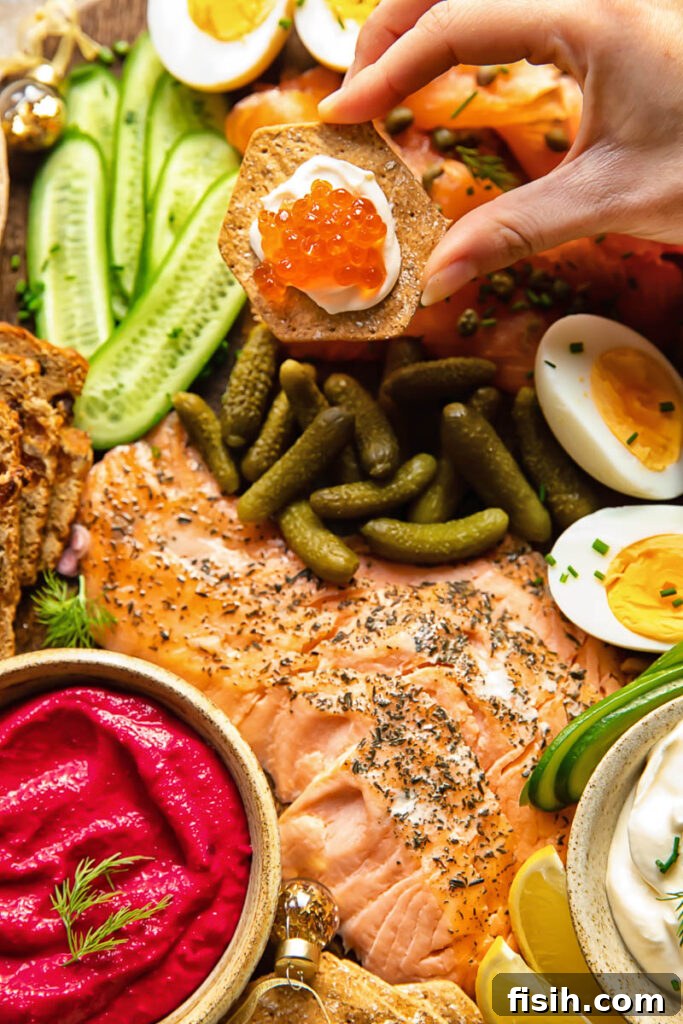 Close up shot of person taking a piece from Scandi-inspired grazing board