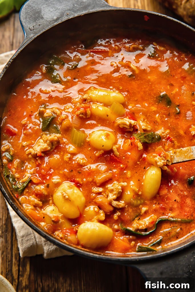 Nduja-Infused Sausage Gnocchi Soup 3 pot of sausage gnocchi soup with a ladle