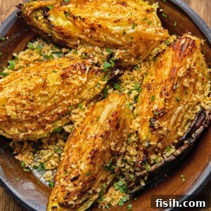 plate of four Miso Butter Roasted Cabbage Wedges