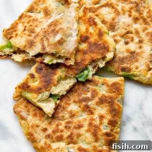 Close up shot of cut open pieces of irish potato farls stack on top each other