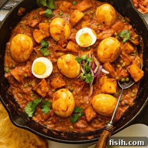 Egg curry in a cast iron frying pan