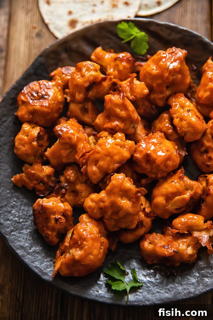 plate of buffalo cauliflower bites on a plate