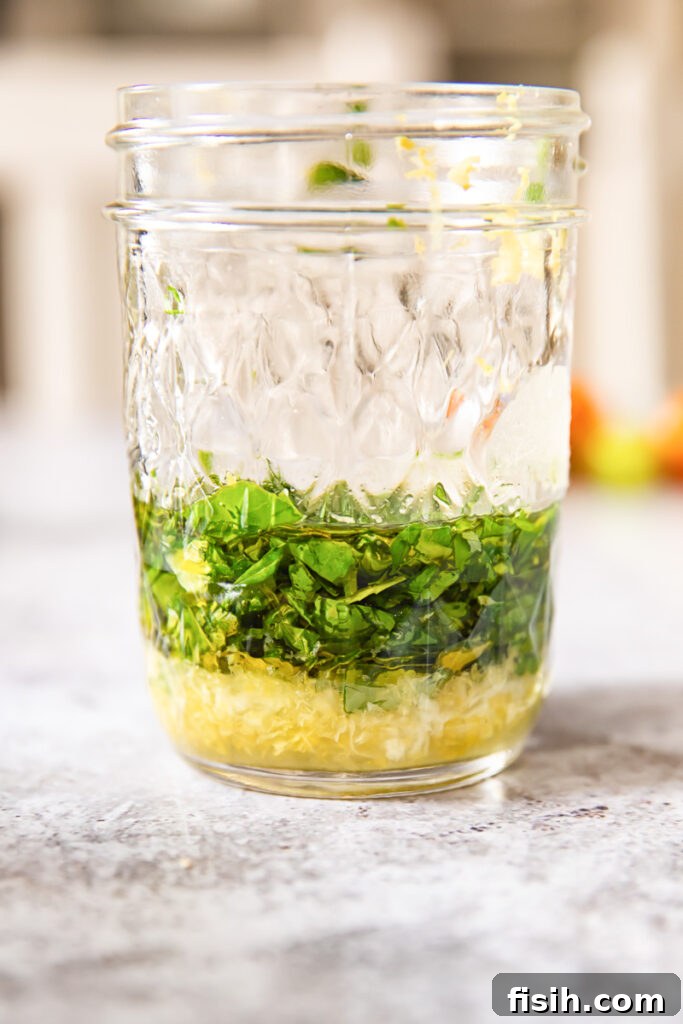 Jar with lemon basil vinaigrette