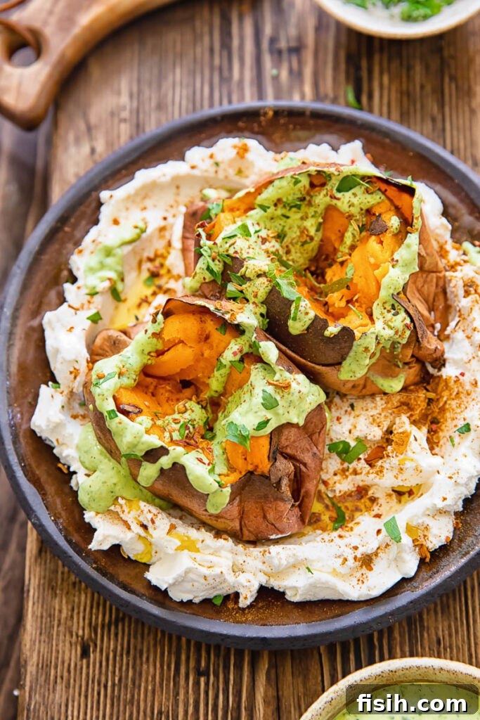 plate of two roasted sweet potatoes with sauces
