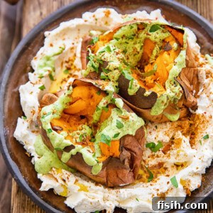 plate of two roasted sweet potatoes with sauces
