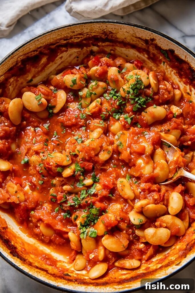 Pan of stew with herbs