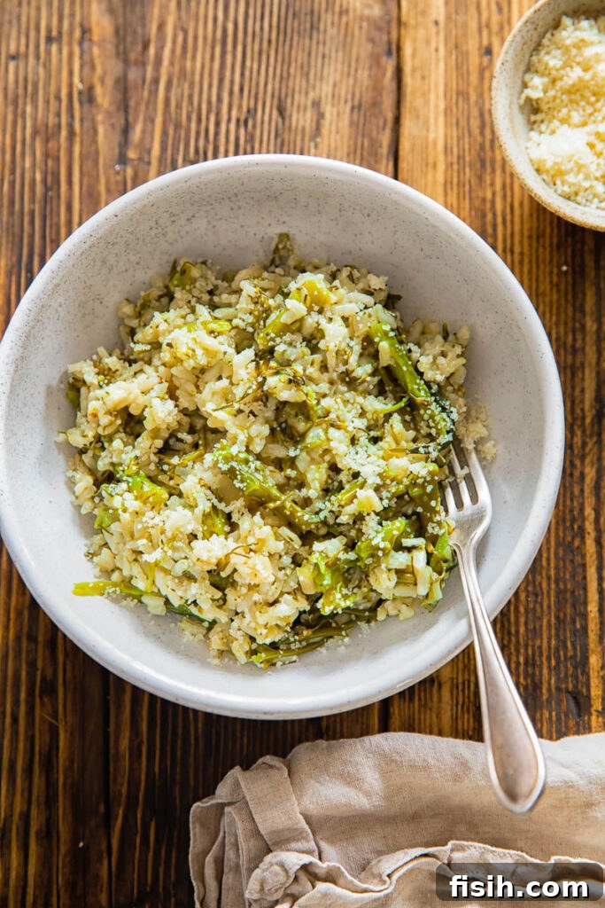 Top down of a bowl full of instant pot risotto with chunks of broccoli