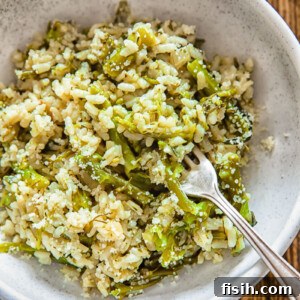 Close up of a small bowl with risotto and a fork