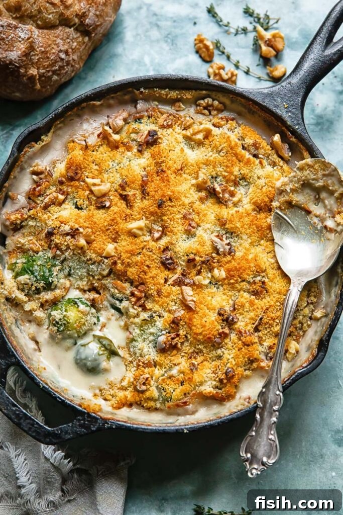 Crispy Topped Brussels Sprouts Gratin 3 Top down shot of Brussels sprouts gratin topped with breadcrumbs in a baking dish
