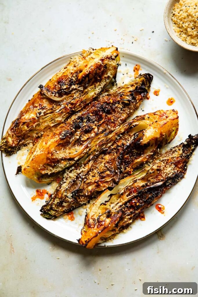 Top down shot of gochujang cabbage wedges on a plate