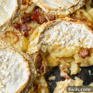 Top down shot of Tartiflette in a cast iron pan