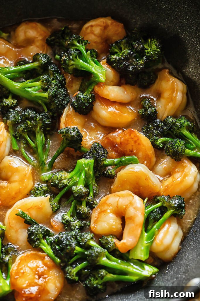 Vibrant Shrimp and Broccoli Stir-Fry 3 Close up shot of shrimp and broccoli stir fry in a pan